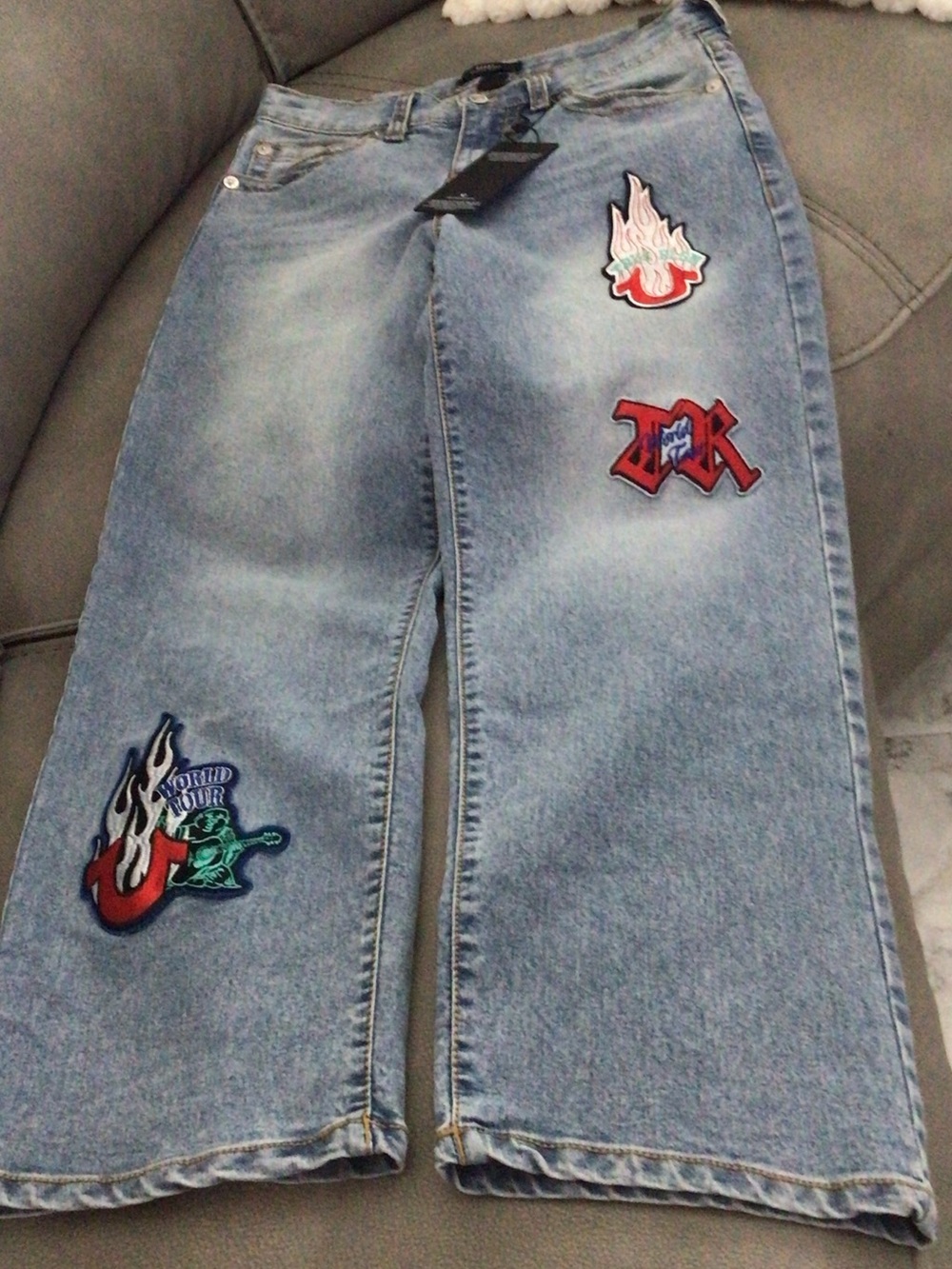 True Religion Light Blue Denim Jeans with Red & Green Patch Accents
